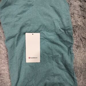 Brand new with tag Lu LU lemon tag